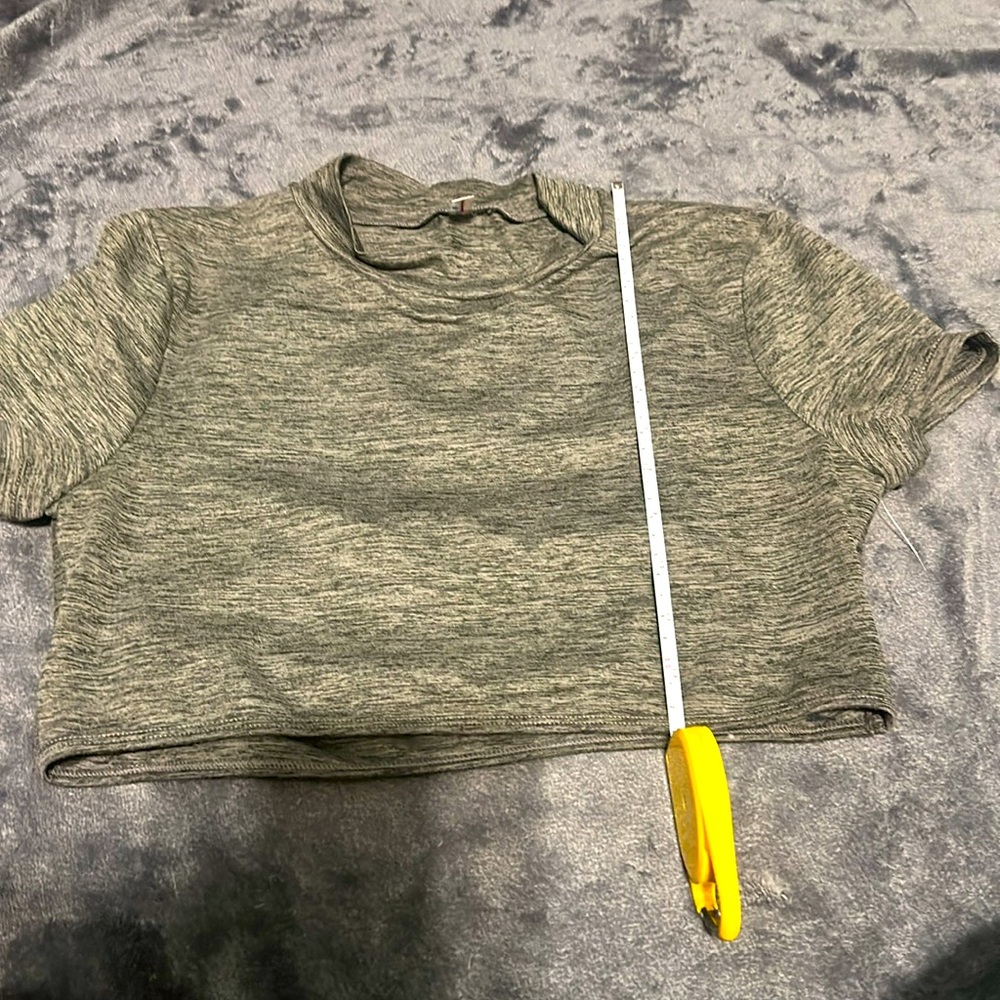 NWOT Mock neck crop top with open back slots FREE PEOPLE MVMNT
